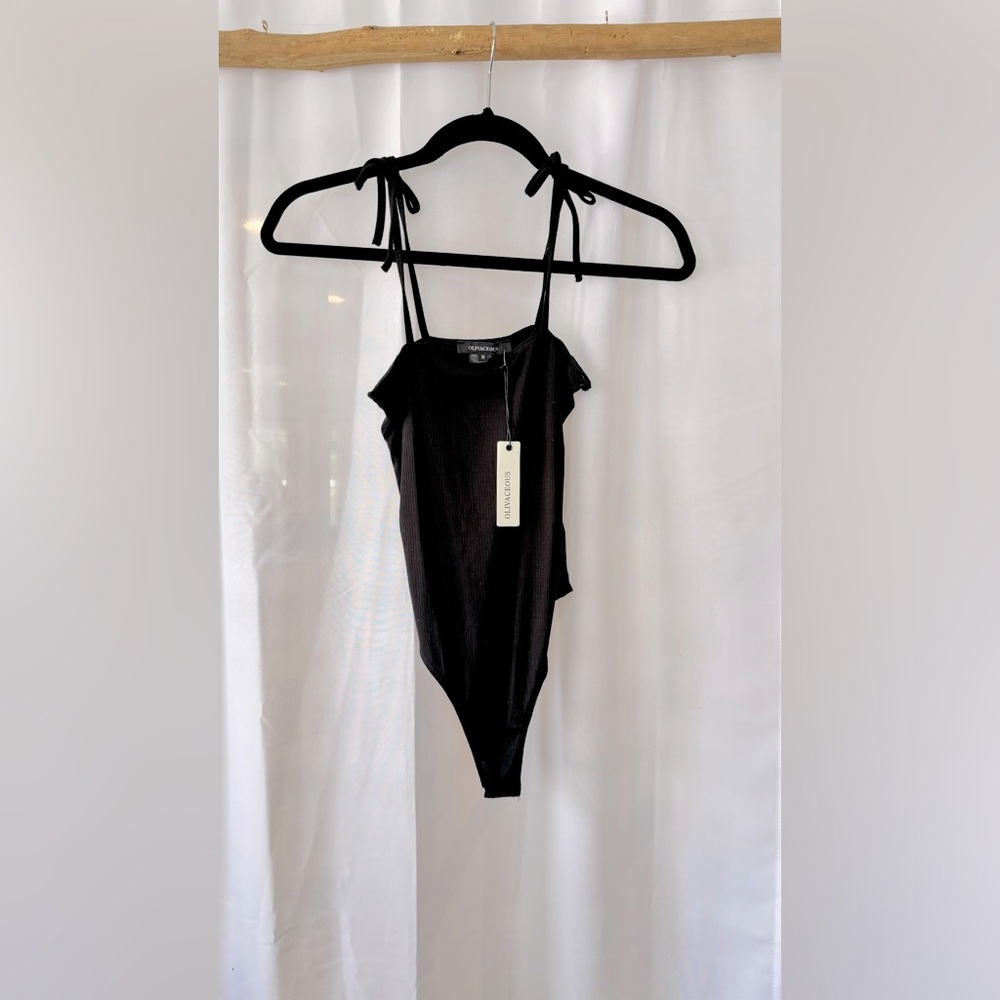 Olivaceous Black Thong Bodysuit. Size Medium. NWT.